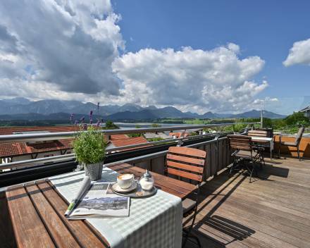 Terrace with view of the Hopfensee Lake and mountains