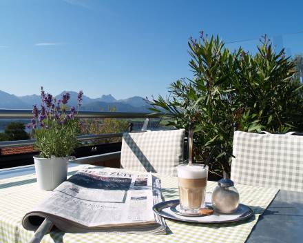 coffee and newspaper at the terrace at spa hotel bavaria