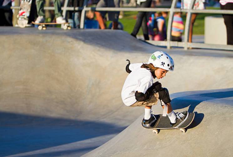 boy with skateboard family vacation